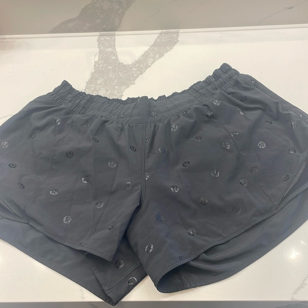 Black hottie shorts with lulullemon logo on them. Size 14 tall